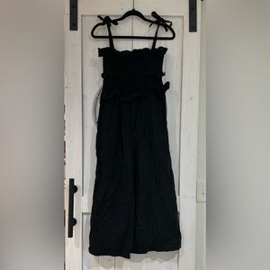 Black jumpsuit with smocked top